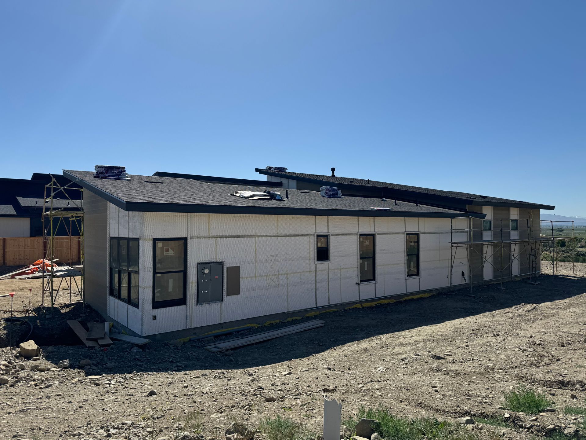 A modern new home is geting stucco installed in Reno, Nevada.