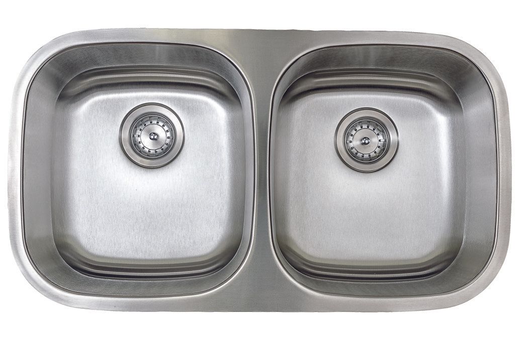 Stainless steel double-basin kitchen sink with two faucets.