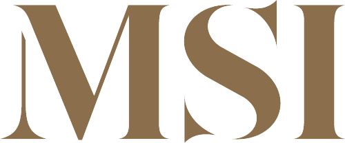 Tan serif letters “MSI” in gold on a white background