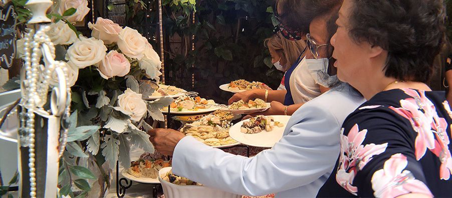 tea service at bexx secret garden assorted tea sandwiches and fresh salads.