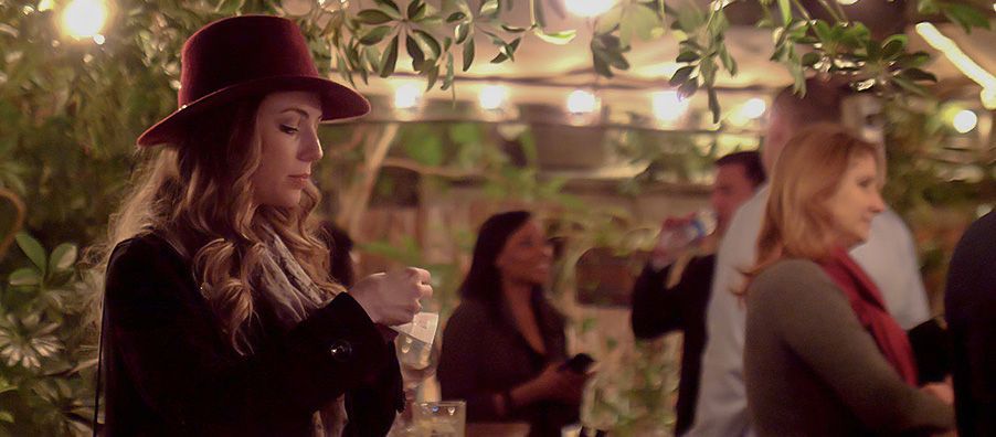 Girl in a hat in bar in bexx secret garden.
