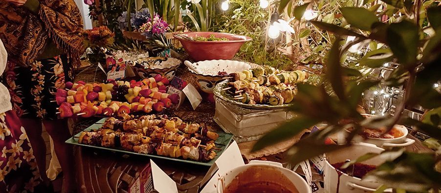 Hawaiian themed buffet with kabobs from the grill made in bexx secret garden 