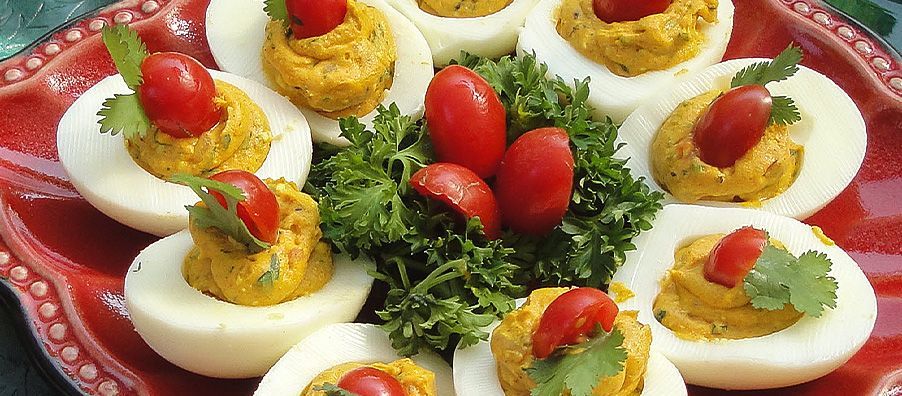 Deviled eggs with mini tomatoes in bexx secret garden