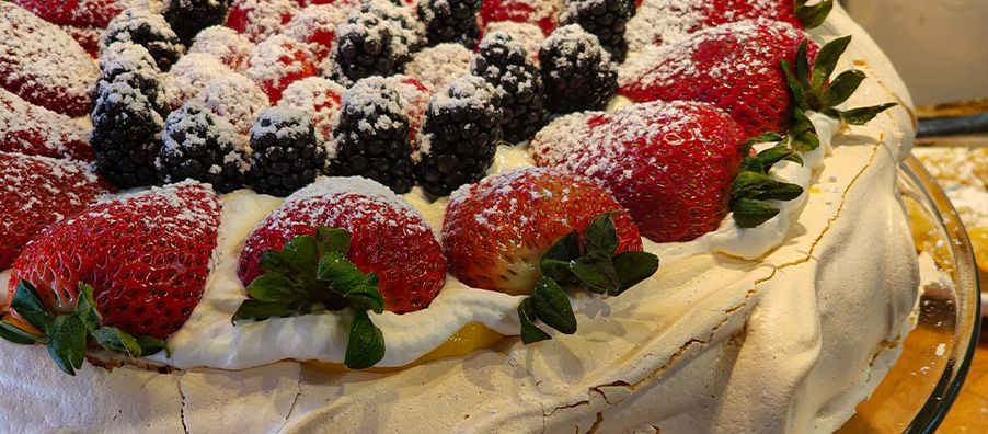 Fresh Fruit Pavlova made by bexx secret garden for afternoon tea party