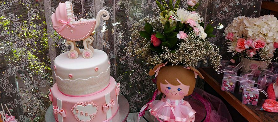 pink buggy baby shower cake in bexx secret garden