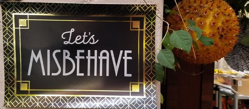Let's Misbehave sign for Roaring 20's party in Bexx secret garden