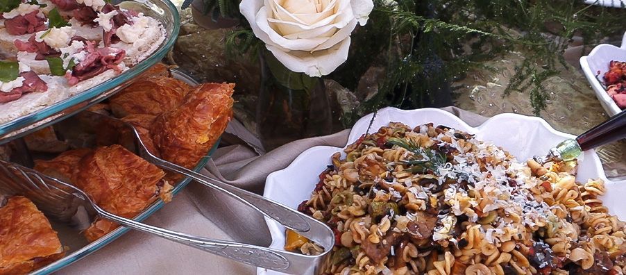 Croissant tea sandwiches and antipasti salad. in bexx secret garden.