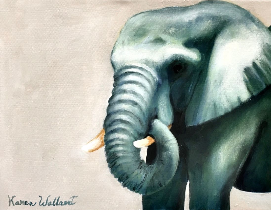 Elephant portrait, blue-grey with tan tusks, trunk curled, against a light brown backdrop.