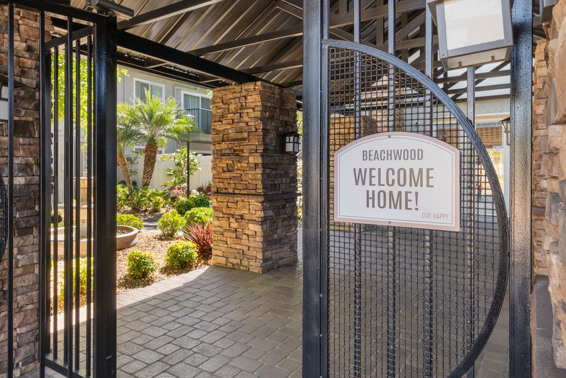 walk in gate with welcome sign