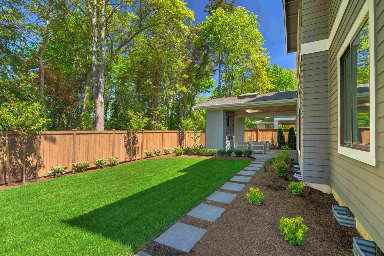 Beautiful house with newly installed wood fence