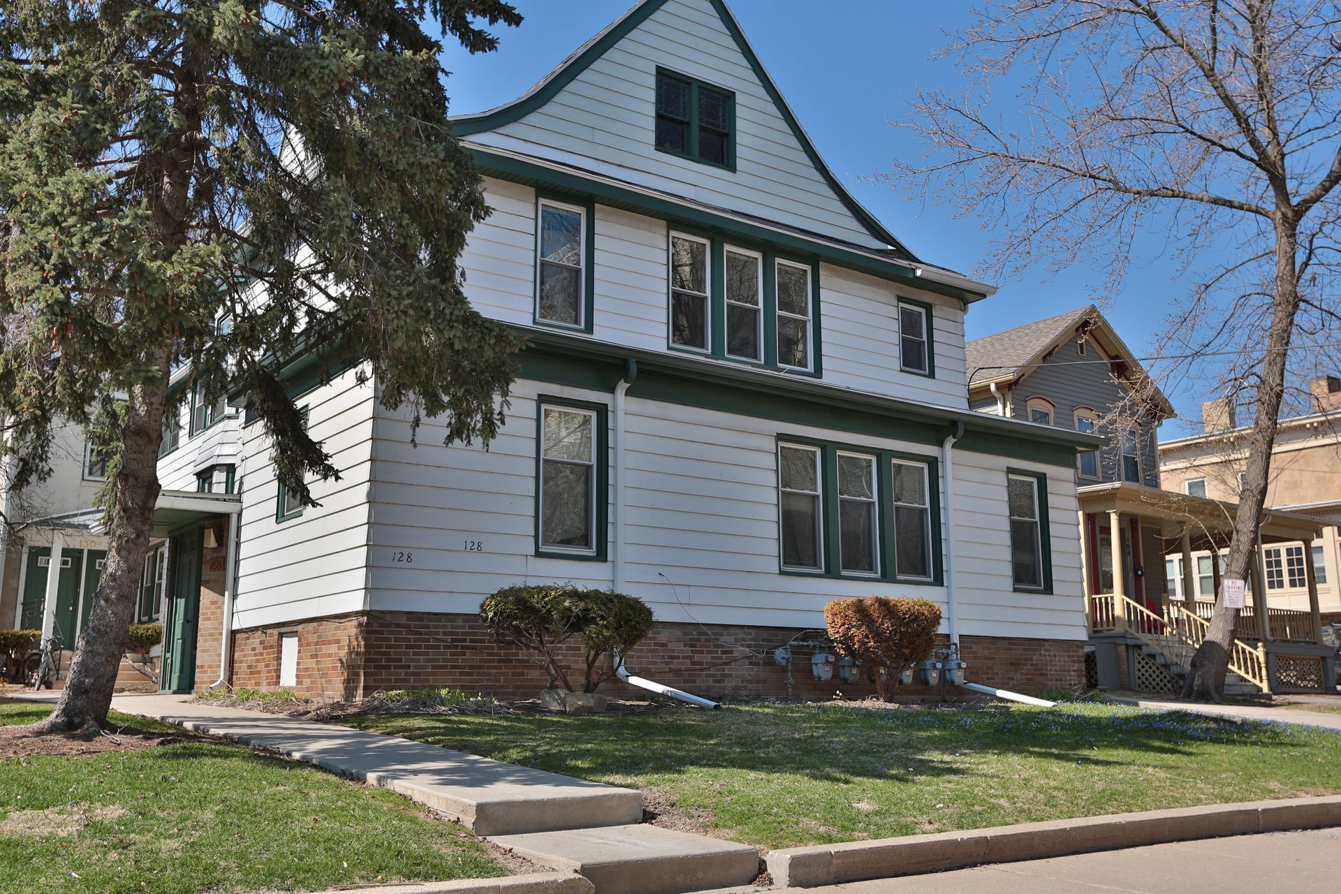 128 and 130 W Gilman apartment building