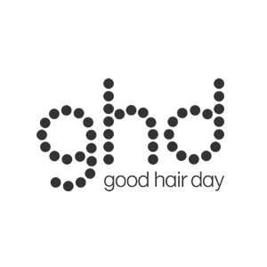 Il logo ghd: le lettere "ghd" formate da puntini scuri, con la scritta "good hair day" sottostante in un elegante carattere sans-serif.