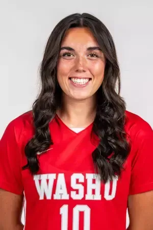 Washington University athlete in a red jersey with “WASHU” and number 10, smiling at the camera.