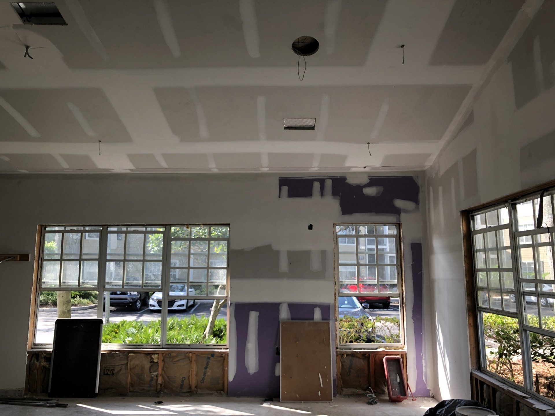 ceiling and wall boards in a remodel room