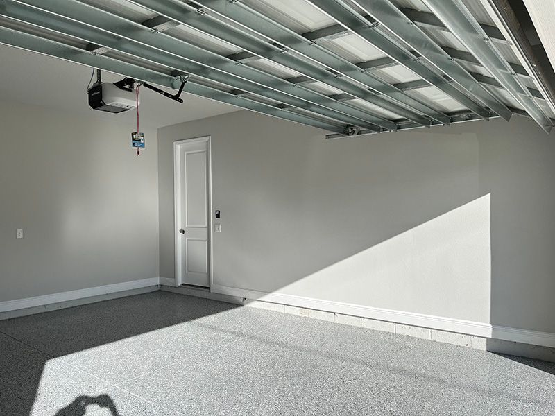 new construction garage, painted home with neutral colors