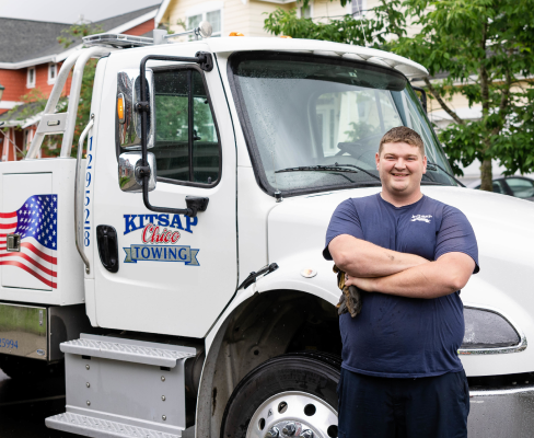 Man Standing With Vehicle | Kitsap Chico Towing image 2