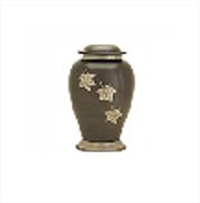 Dark ceramic urn with gold floral accents on a white background