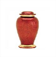 Red decorative urn with gold trim on a white background