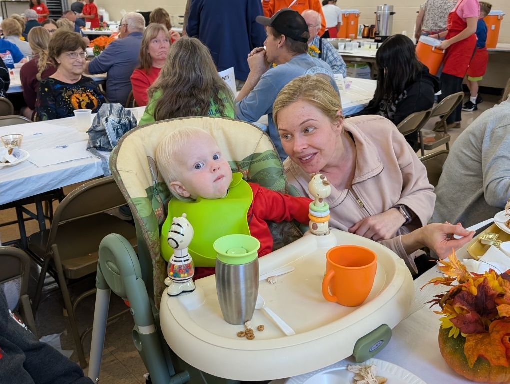 Child enjoying our Chicken Dinner