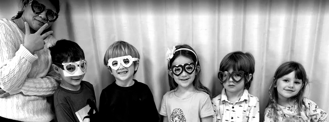 Children in heart glasses
