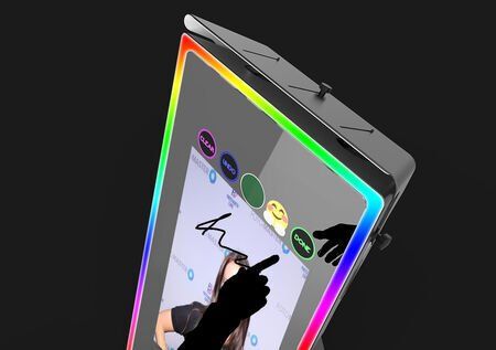 A hand is pointing at a picture of a woman on a tablet.