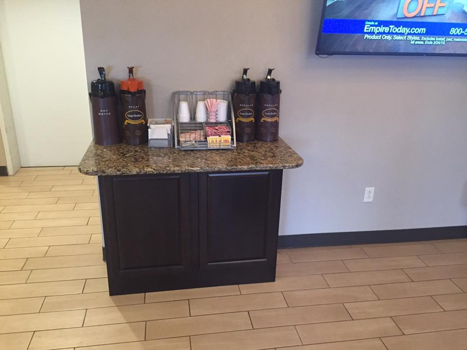 A counter in a room with a tv that says off