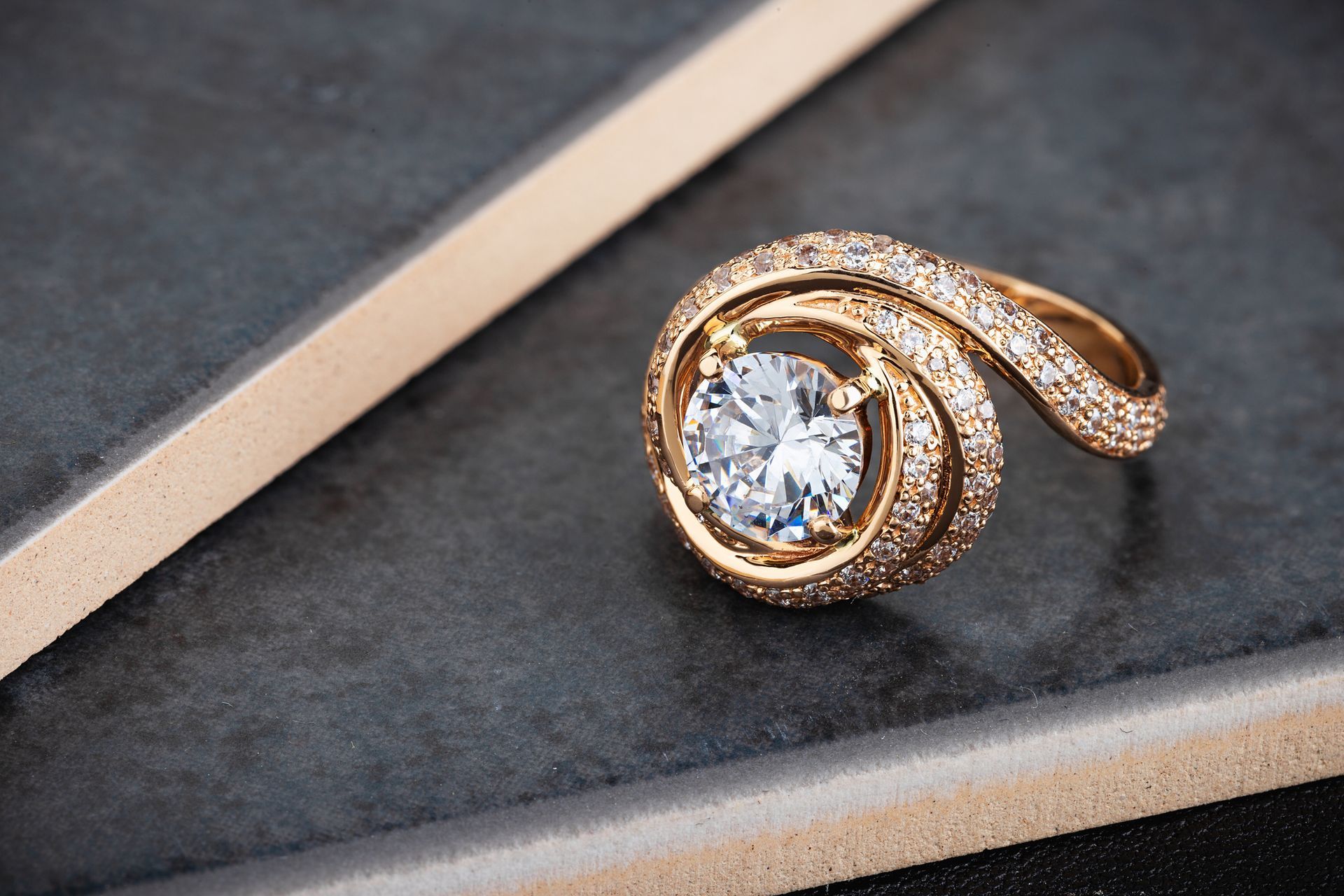 A gold ring with a diamond in the center