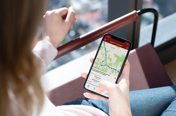 Branded rider app showing live bus tracking and arrival predictions