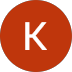 Orange circle with a white letter “K” icon