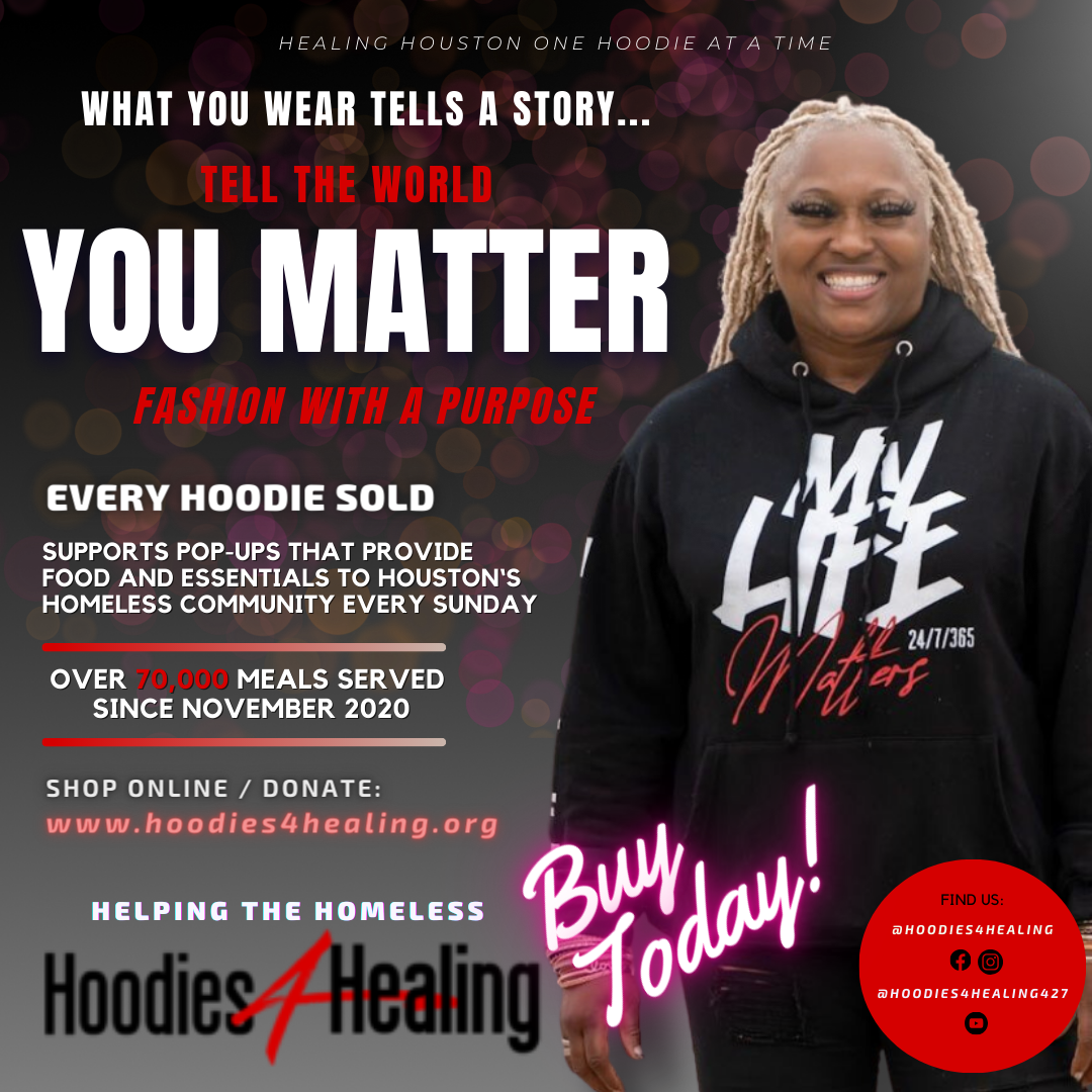 A woman wearing a black hoodie that says