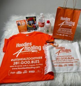 A hoodies healing foundation t-shirt is on a table