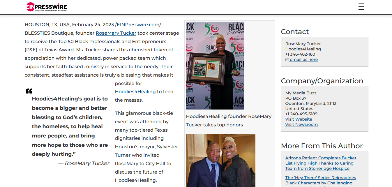 A newspaper article about a man holding a certificate