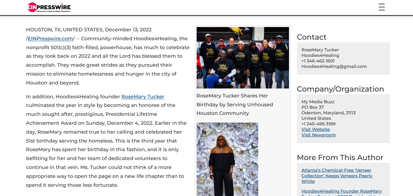A newspaper article with a picture of a woman and a group of people