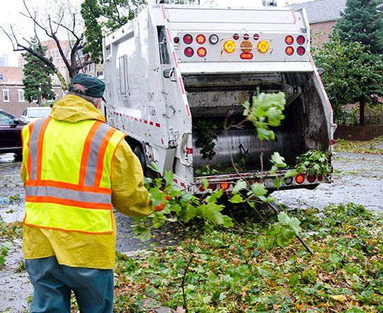 Worker Cleaning Road — Atkinson, WI — JAK Property Services