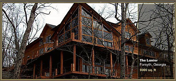 a large wooden house with a lot of windows is surrounded by trees .