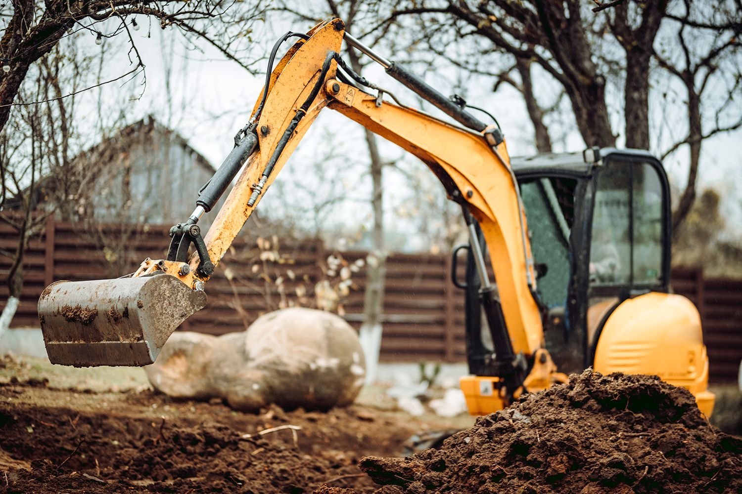 Landscaping works with mini excavator