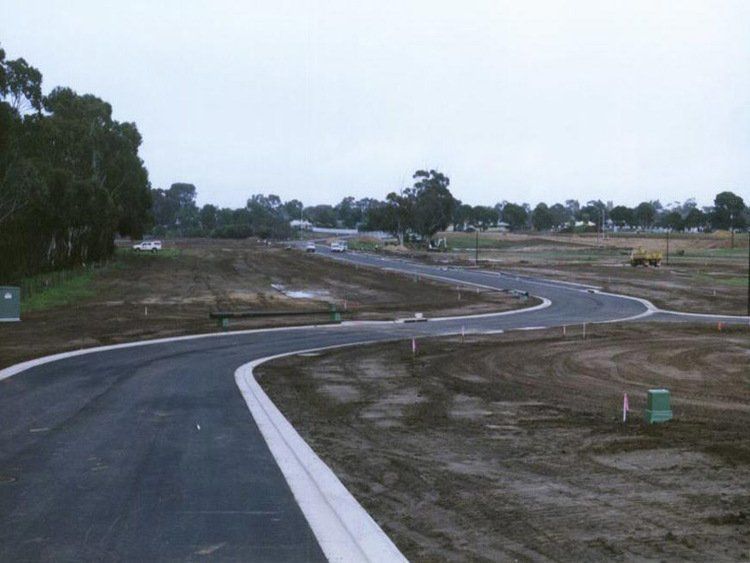 Road Going Through a Field with Trees in the Background — Victor Harbor, SA — South Coast Sand & Civil