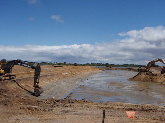 Excavator Working in a Muddy Area — Victor Harbor, SA — South Coast Sand & Civil