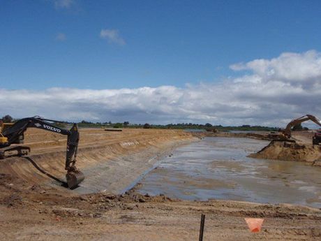 Excavator Working in a Muddy Area — Victor Harbor, SA — South Coast Sand & Civil