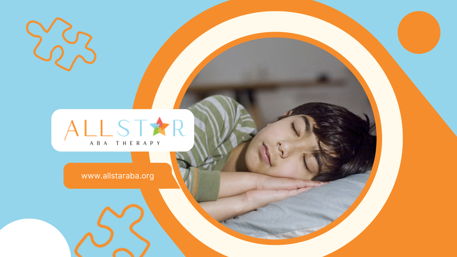Sleeping child in a green striped shirt resting on a pillow, with a small logo in the corner