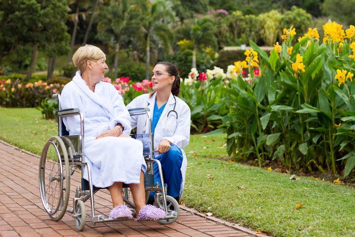 Nurse And Patient On Wheelchair — Mason, OH — Acclaim Home Health Services