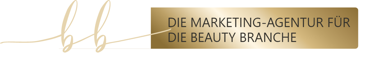 Ein goldenes Schild mit der Aufschrift „Die Marketingagentur für die Beautybranche“