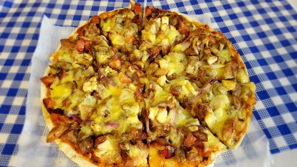 Pizza on Parchment Paper — Boundary Street Fish & Burger Bar in Railway Estate, QLD