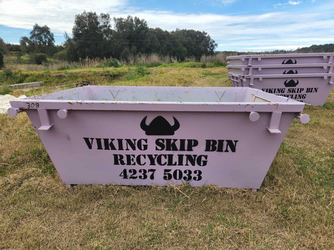 A Purple Dumpster With Viking Skip Bin Recycling Written on It — Viking Skip Bin Recycling In Shellharbour, NSW