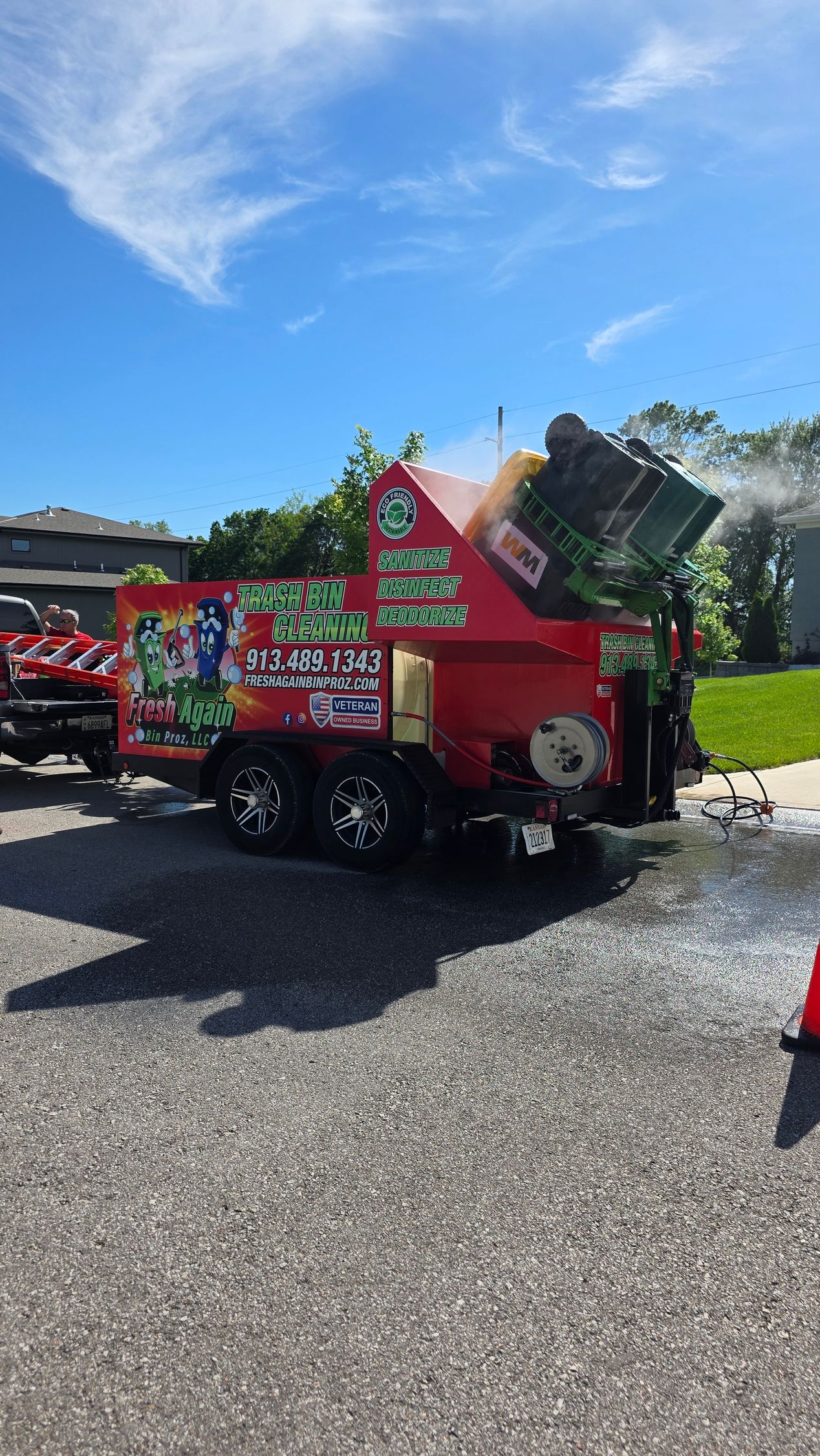 Phil steam cleaning a bin with the Fresh Again Bin Proz rig