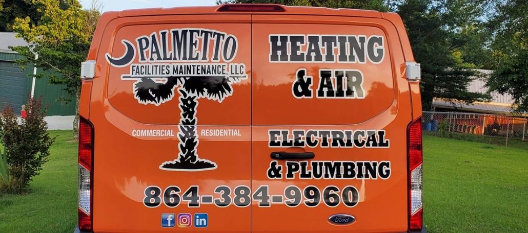 The back of an orange van for palmetto heating and air electrical and plumbing