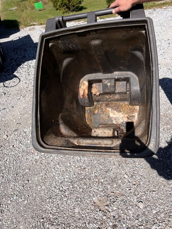 Dirty trash can before Can-Cleaner service