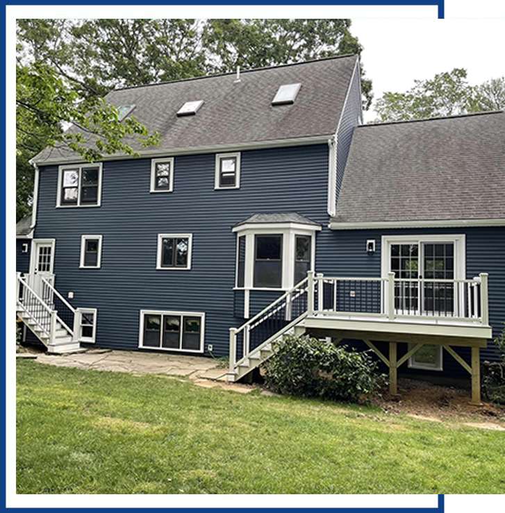 Blue House With A Deck — Raynham, MA — JDM Siding And Windows