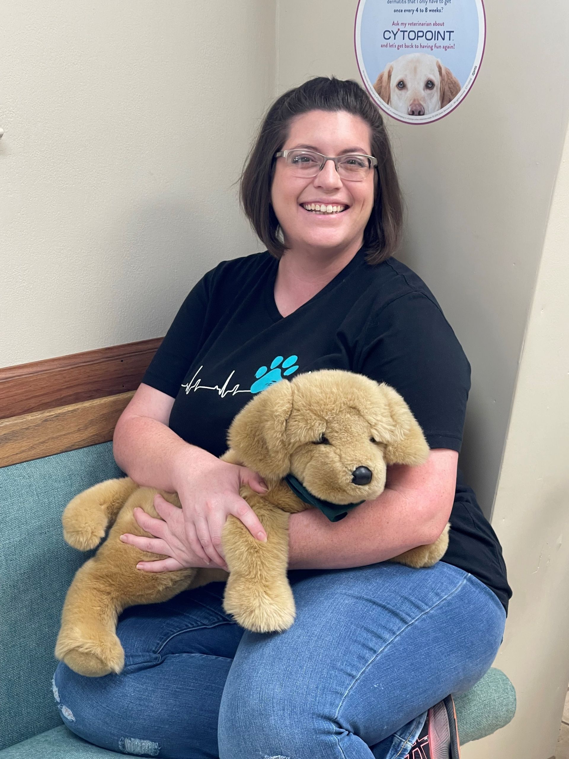 Happy Pet Owner Holding Stuffed Animal in Brownwood, TX