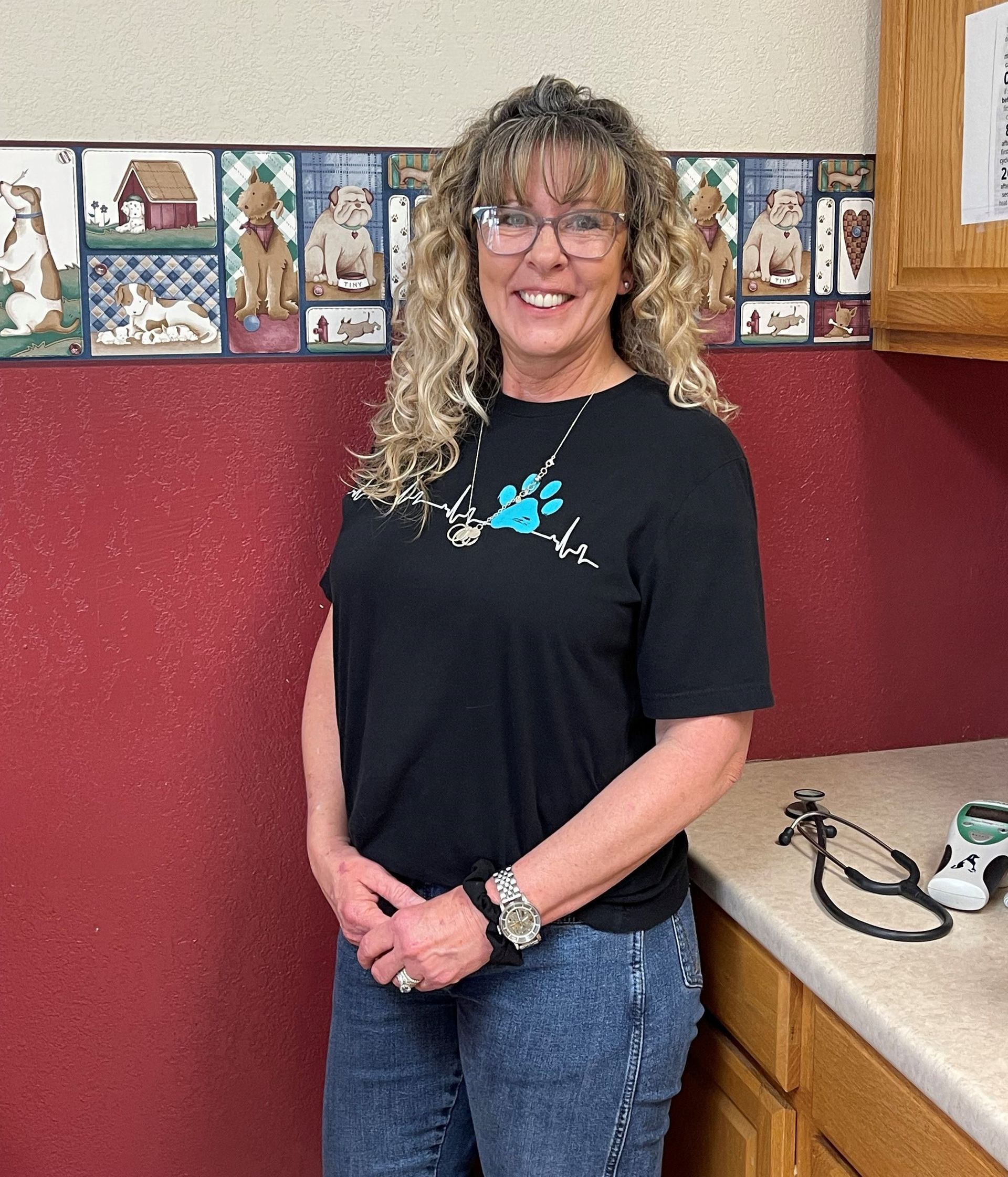 Veterinary clinic receptionist Robbi